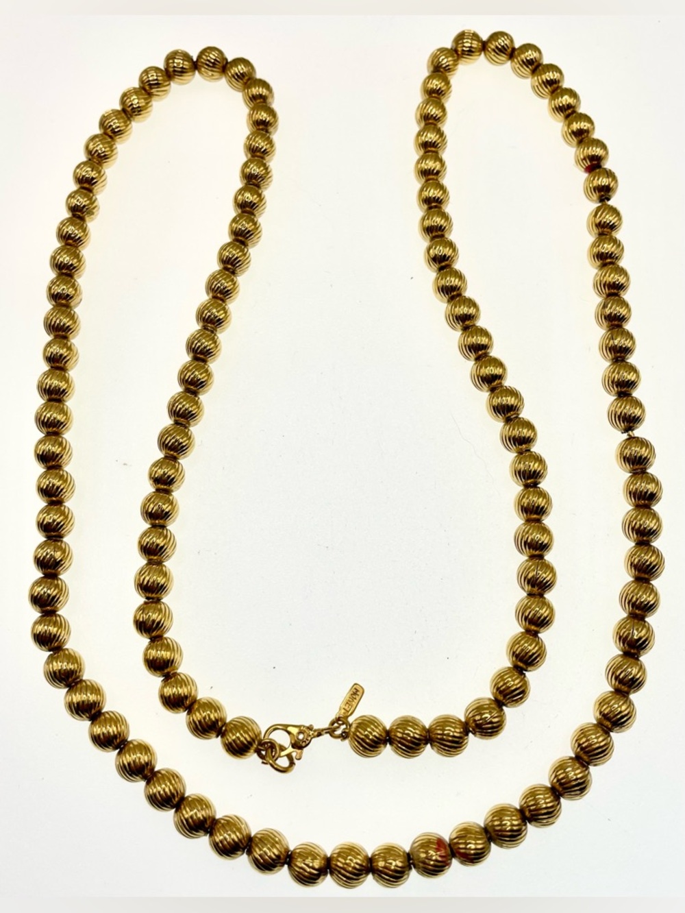 Vintage Monet Gold Tone Beads on Chain Necklace 1970s Ribbed Texture Signed